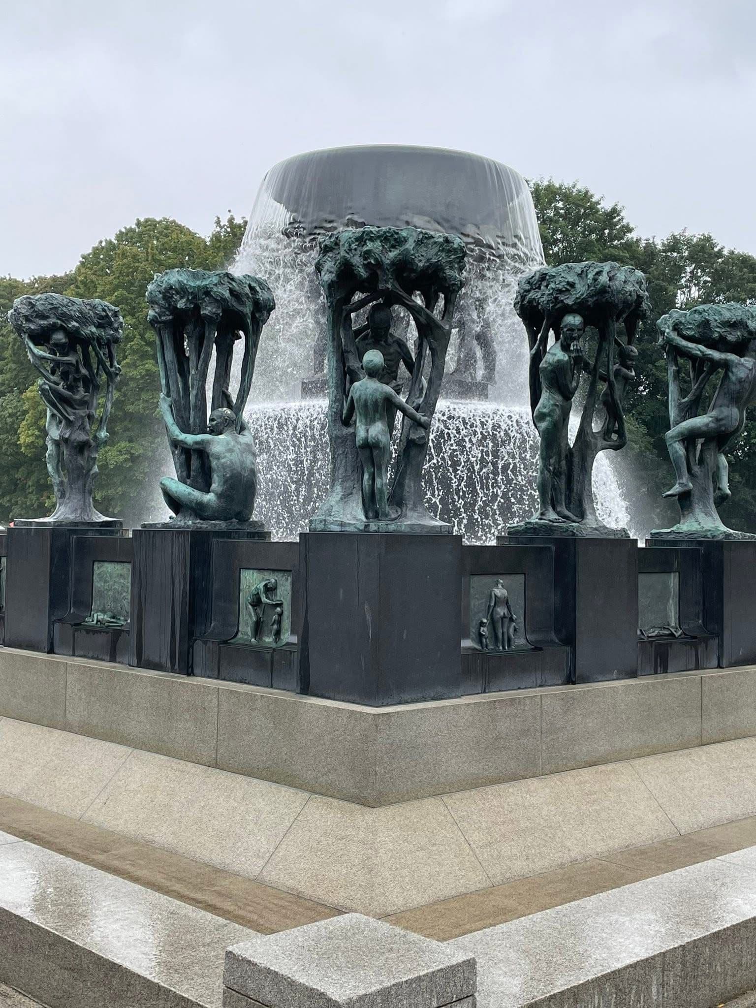 Vigeland Fountain with bronze human sculptures and cascading water at Frogner Park, Oslo, Norway.
